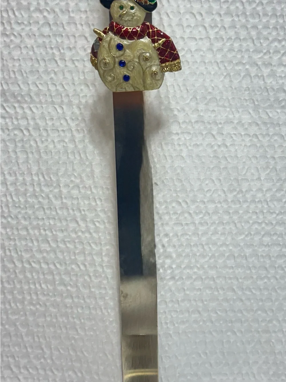 Vintage metal stocking holder with Snowman Enamel Bookmark Gold & Red